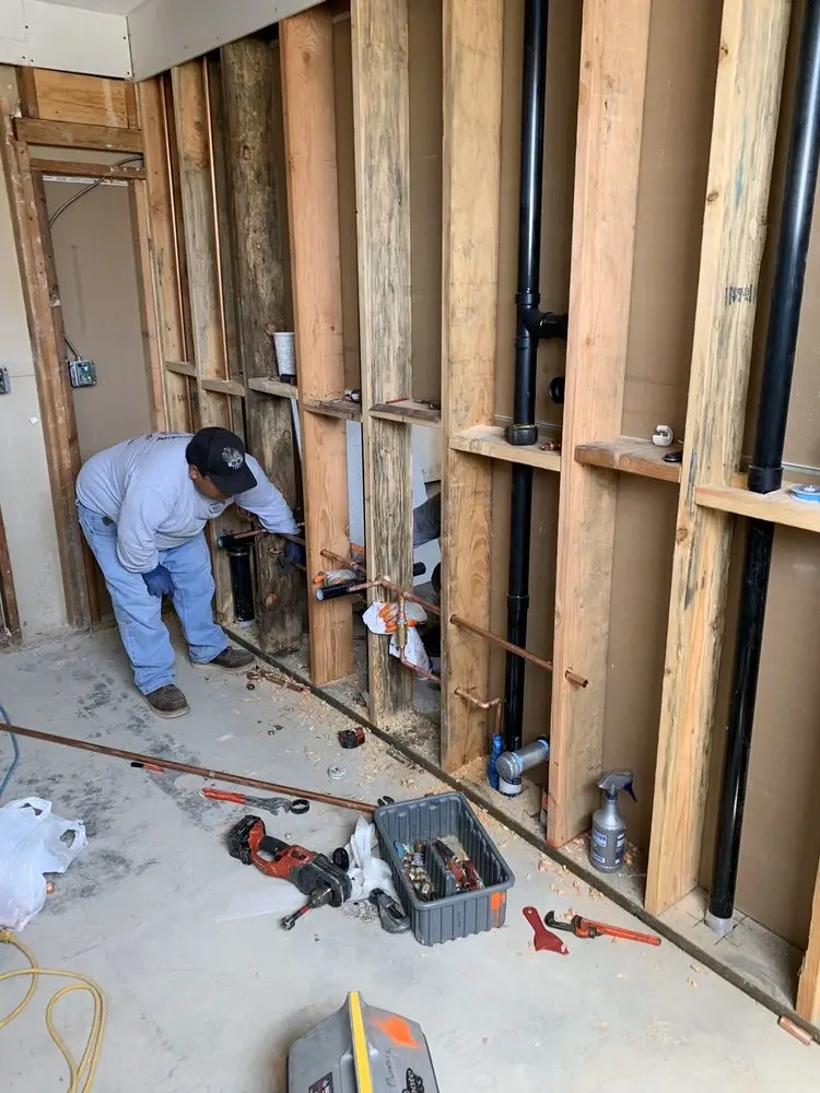 Commercial rough-in plumbing for Water Heater Replacement in Spring Lake